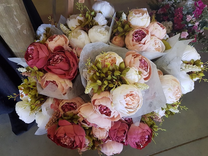 Choose seasonal flowers to match your theme and colour scheme. These bouquets from Shongweni Farmers and Craft Market.