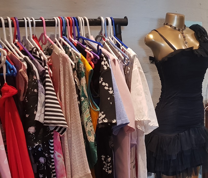 Rails of vintage and pre-loved garments from the Pot and Kettle.