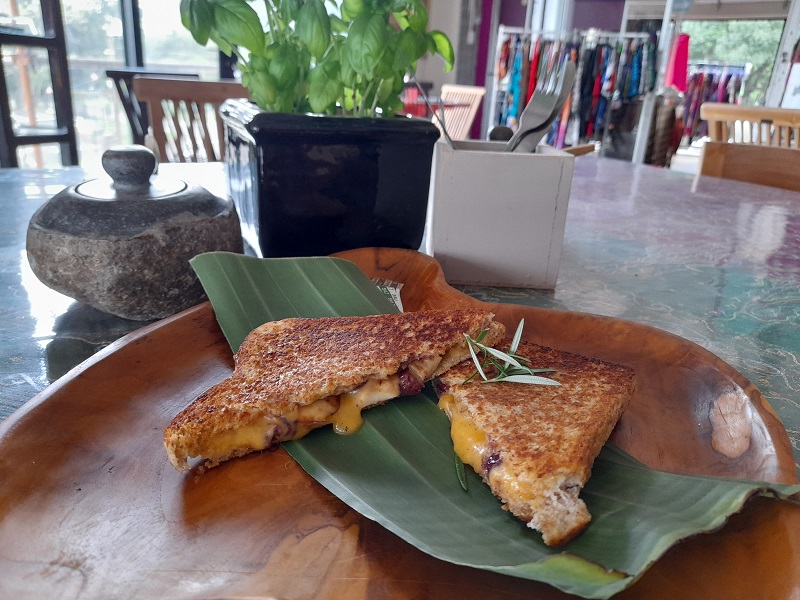 A sandwich served on a banana leaf in the cafe.