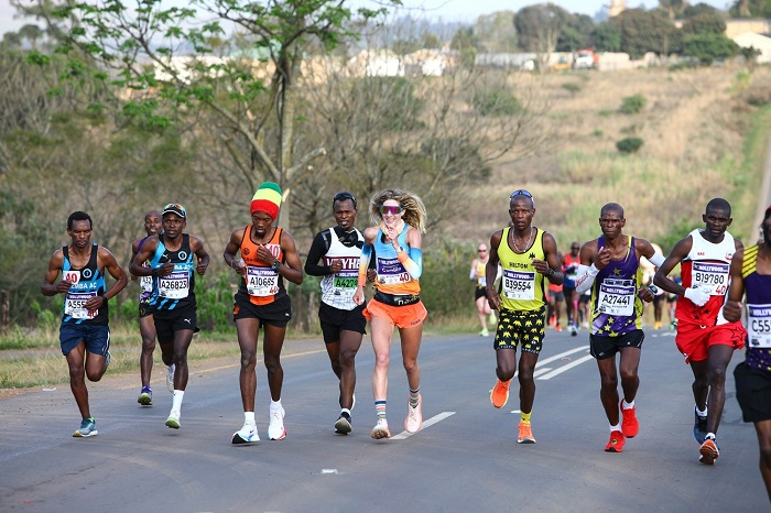 Running together: a pack of marathoners looking strong. Pic: Comrades website
